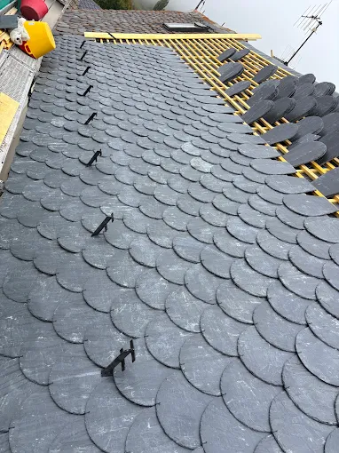 Travaux de couverture · Le Soler